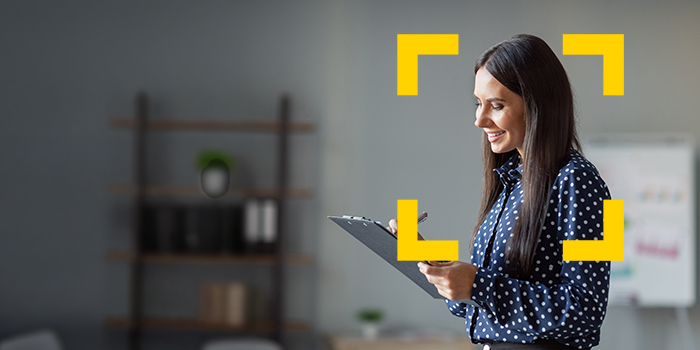woman going through checklist for legal staffing