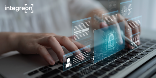 Hands typing on a laptop with floating holographic security panels and a shield icon; Integreon logo visible in the corner.
